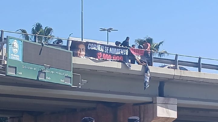 Quisieron detener a judiciales por colgar un cartel contra Alfredo Cornejo