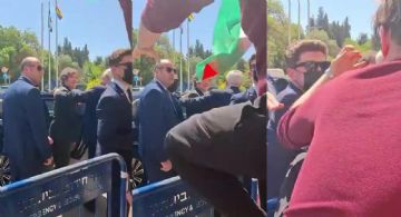 Un hombre con una bandera de Palestina intentó agredir a Javier Milei 