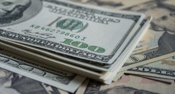 El dólar oficial superó los $1.460 en bancos