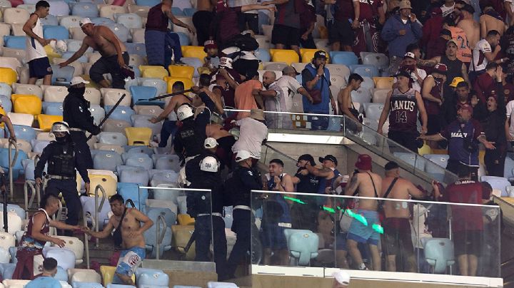 La historia de siempre: policías brasileños pegándole a hinchas argentinos