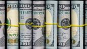 Foto ilustrativa de la nota titulada: El dólar alcanzó los $1.405 en bancos